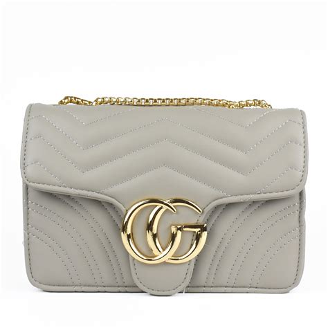 does the white gucci marmont have a gray tint|Gucci Marmont bag worth it.